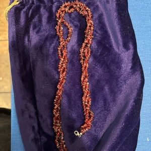 This is a red ruby necklace, 19” length, au 925 sterling silver clasp